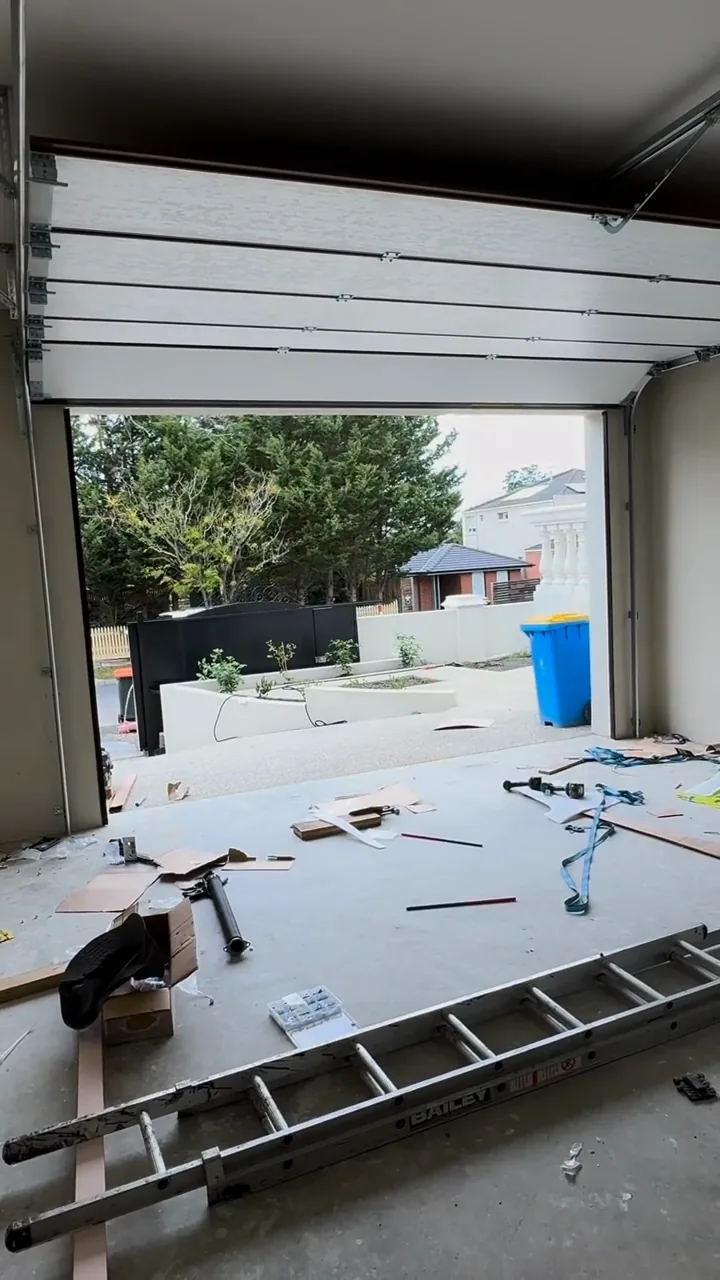 Inside view showing the door, tracks and installation work.